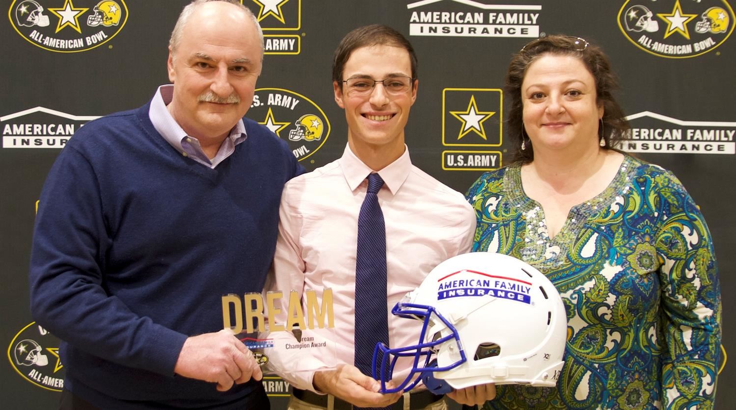 Samer issa of Green Hope High School with parents receiving All-American marching band honors. 